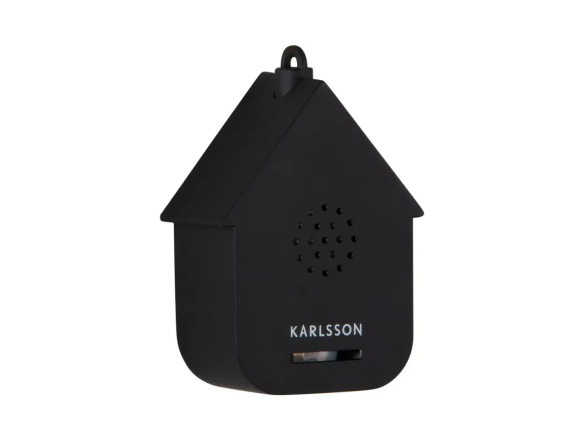 Zijaanzicht van de strakke minimalistische Karlsson mini cuckoo sound box in de kleur mat zwart.