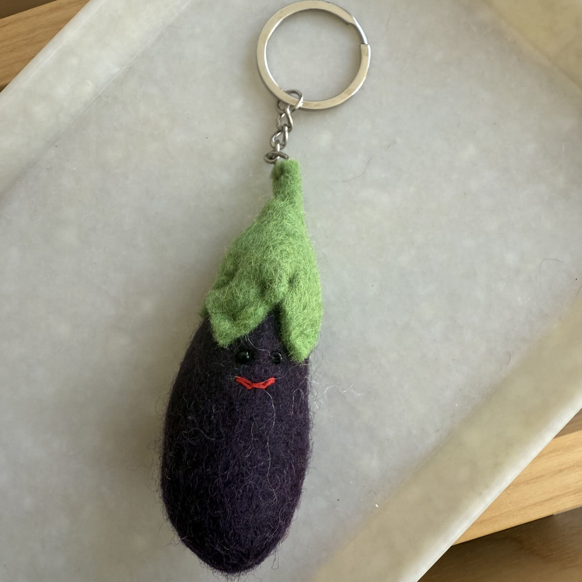 Sleutelhanger vilt aubergine - cadeau van Kado in Huis