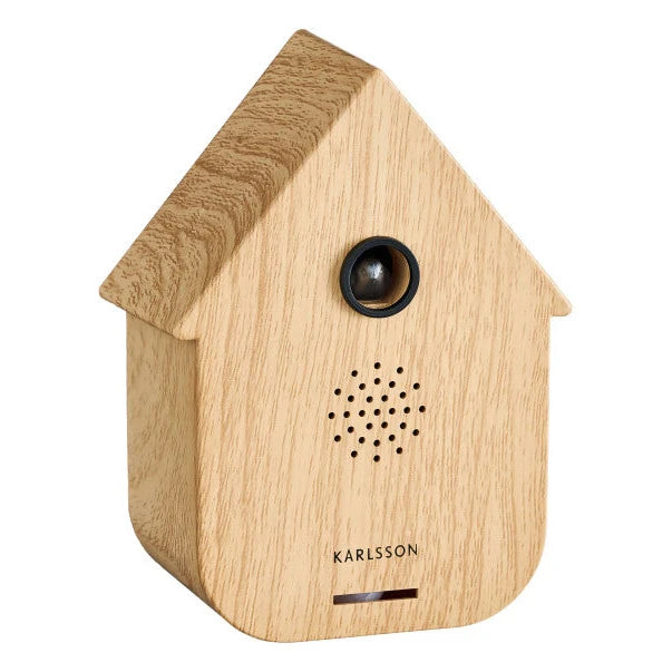 Zijaanzicht van de strakke minimalistische Karlsson cuckoo sound box in lichte houtkleur